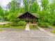 An outdoor pavilion offers picnic tables and stone accents, nestled in a park-like setting at 724 Lagan Ct, Fort Mill, SC 29715