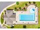 Aerial view of community pool with lap lanes and lounge chairs for relaxing on a sunny day at 724 Lagan Ct, Fort Mill, SC 29715