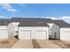 Rear garages offer convenient parking for residents with ample space at 8118 Jacey Ln # 20, Huntersville, NC 28078