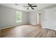 Bright bedroom with a ceiling fan, a window, and neutral-toned walls at 842 Murphy St, Kannapolis, NC 28081