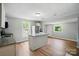 The kitchen has modern appliances, stone counters and a large island at 842 Murphy St, Kannapolis, NC 28081