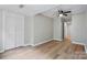 An ample living area featuring vinyl flooring, overhead lighting, and closet at 842 Murphy St, Kannapolis, NC 28081
