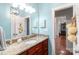 Bathroom featuring granite countertops, updated fixtures, and a bright, clean design at 945 Songbird St, Lancaster, SC 29720