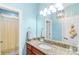 Well-lit bathroom with granite vanity, shower, and neutral color palette at 945 Songbird St, Lancaster, SC 29720