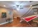 Bonus room showcasing hardwood floors, a ceiling fan, and an arcade game at 945 Songbird St, Lancaster, SC 29720