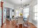 Sunny breakfast nook with a round table and view to the kitchen at 945 Songbird St, Lancaster, SC 29720