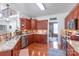 Beautiful kitchen with granite countertops, stainless steel appliances, and wood cabinets at 945 Songbird St, Lancaster, SC 29720