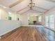Bright living room with vaulted ceilings, hardwood floors, and open floor plan at 9565 Man O War Rd, Indian Land, SC 29707