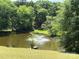 Pond view with fountain and greenery at 9565 Man O War Rd, Indian Land, SC 29707