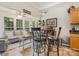 Bright breakfast nook with bar stools and ample natural light at 10011 Spring Park Dr, Charlotte, NC 28269