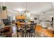 Open concept kitchen with breakfast nook and view into a bright and cozy living room at 10011 Spring Park Dr, Charlotte, NC 28269