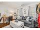 Comfortable room features a sofa, a desk, and plenty of storage at 10011 Spring Park Dr, Charlotte, NC 28269