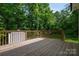 The large deck is perfect for entertaining and enjoying the outdoor scenery at 1012 W Carroll St, Cherryville, NC 28021