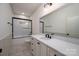 Bathroom featuring a tub/shower combo, white vanity with quartz counters at 1012 W Carroll St, Cherryville, NC 28021