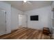 Bright bedroom with luxury vinyl plank flooring and a walk-in closet at 1012 W Carroll St, Cherryville, NC 28021