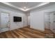 Spacious bedroom with wood floors, and multiple closets offering ample storage solutions at 1012 W Carroll St, Cherryville, NC 28021