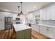 Contemporary kitchen featuring custom cabinets, stainless steel appliances, and a stylish kitchen island at 1012 W Carroll St, Cherryville, NC 28021