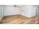 Bright living room boasting hardwood floors, neutral paint, ceiling fan, and ample natural light at 1012 W Carroll St, Cherryville, NC 28021