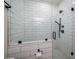 Elegant glass enclosed shower with white subway tile and sleek black fixtures at 1012 W Carroll St, Cherryville, NC 28021