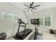 Home gym with modern exercise equipment, great natural light and ample space for working out at 106 Thunder Hill Rd, Mooresville, NC 28117