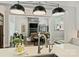 Open floor plan showing living room with fireplace and kitchen island with modern countertops and seating at 106 Thunder Hill Rd, Mooresville, NC 28117