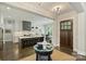Modern kitchen featuring a large center island, stainless steel appliances, and an open layout at 106 Thunder Hill Rd, Mooresville, NC 28117
