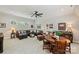 Spacious living room offering ample seating and stylish decor with a ceiling fan at 106 Thunder Hill Rd, Mooresville, NC 28117