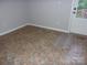 Room with vinyl flooring and natural light from the glass paneled door at 109 Gatwick Ct, Statesville, NC 28677