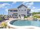 Expansive backyard featuring a large in-ground pool, patio seating, and a well-maintained lawn at 1098 Matchstick Sw Pl, Concord, NC 28025