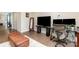 Bright office space featuring a large screen TV and a large desk with two computer monitors at 1098 Matchstick Sw Pl, Concord, NC 28025