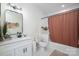 Elegant bathroom featuring modern fixtures, subway tile, and a shower with a stylish curtain, offering a clean and updated feel at 115 Woodward Way, Iron Station, NC 28080