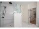 Modern bathroom with glass shower enclosure, subway tile, and stylish fixtures at 115 Woodward Way, Iron Station, NC 28080