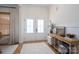 Welcoming entryway with hardwood floors, white wainscoting, and double doors at 115 Woodward Way, Iron Station, NC 28080