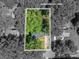 Aerial view of home's lot line and surrounding trees and neighborhood at 1324 Princeton Ave, Gastonia, NC 28054
