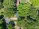 Aerial view of a lush neighborhood with mature trees and well-maintained homes at 1324 Princeton Ave, Gastonia, NC 28054