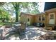 Outdoor patio with dining and seating areas, ideal for entertaining at 1324 Princeton Ave, Gastonia, NC 28054