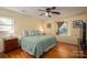 Bedroom featuring natural light, hardwood floors, and a bed with patterned quilt at 1324 Princeton Ave, Gastonia, NC 28054