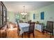 Elegant dining room with hardwood floors and soft, natural light at 1324 Princeton Ave, Gastonia, NC 28054