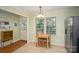 Cozy kitchen nook featuring a small table and stainless steel appliances at 1324 Princeton Ave, Gastonia, NC 28054