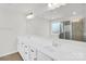 Bathroom boasting double sinks, ample counter space, and a large mirror at 13332 Caite Ridge Rd, Davidson, NC 28036