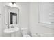 Bathroom featuring a pedestal sink and natural light at 13332 Caite Ridge Rd, Davidson, NC 28036