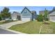 Attractive home featuring an attached two-car garage and beautifully kept lawn at 13332 Caite Ridge Rd, Davidson, NC 28036