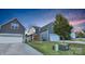 Attractive home featuring an attached garage, and nicely kept lawn at 13332 Caite Ridge Rd, Davidson, NC 28036