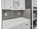 Close up of kitchen countertop with grey subway tile backsplash at 13332 Caite Ridge Rd, Davidson, NC 28036