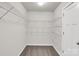 A walk-in closet featuring adjustable wire shelving for optimal storage solutions at 13332 Caite Ridge Rd, Davidson, NC 28036