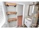 Bathroom featuring wood shelving and a granite vanity at 13932 Queens Harbor Rd, Charlotte, NC 28278