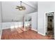 Bedroom with vaulted ceilings, large closet, and view to bathroom at 13932 Queens Harbor Rd, Charlotte, NC 28278