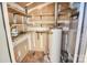 A well organized utility room with ample shelving and equipment for a efficient home at 13932 Queens Harbor Rd, Charlotte, NC 28278