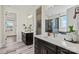 Elegant bathroom featuring dual vanities, modern fixtures, and a spacious shower with stylish tile at 149 Glenn Dr, Mooresville, NC 28115