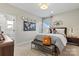 A bedroom with neutral walls, a full bed and modern decor at 149 Glenn Dr, Mooresville, NC 28115